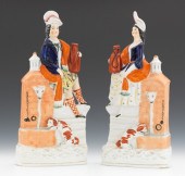 A Pair of Figurines with Urns