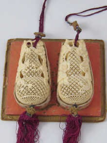 A pair of finely carved and pierced