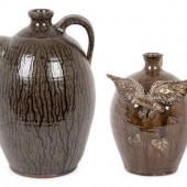 A Pair of Folk Art Pottery Jug