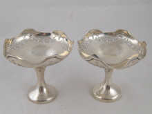 A pair of footed bonbon dishes with