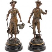 A Pair of French Cast Metal Fi