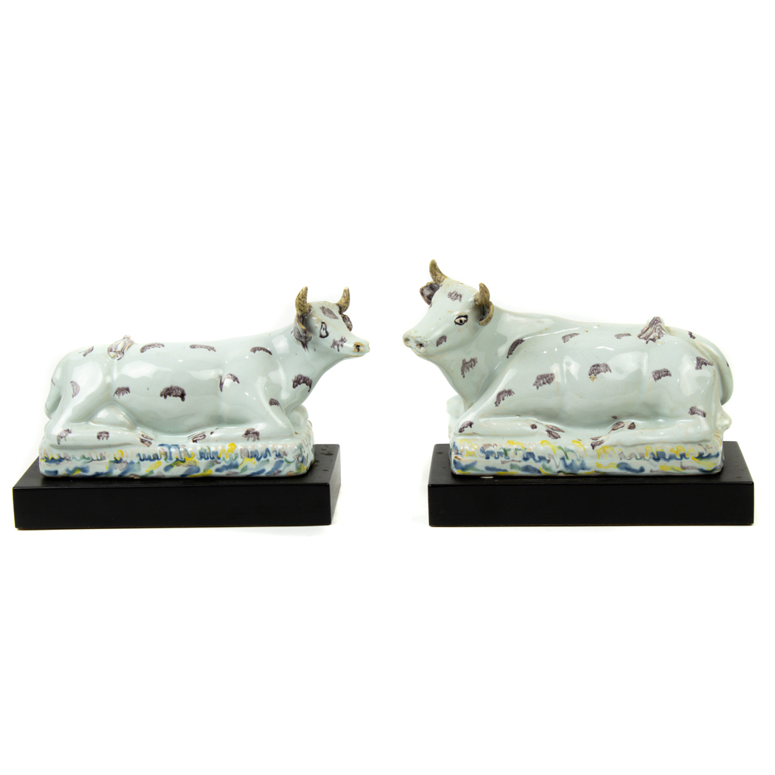 A PAIR OF FRENCH FAIENCE MODELS