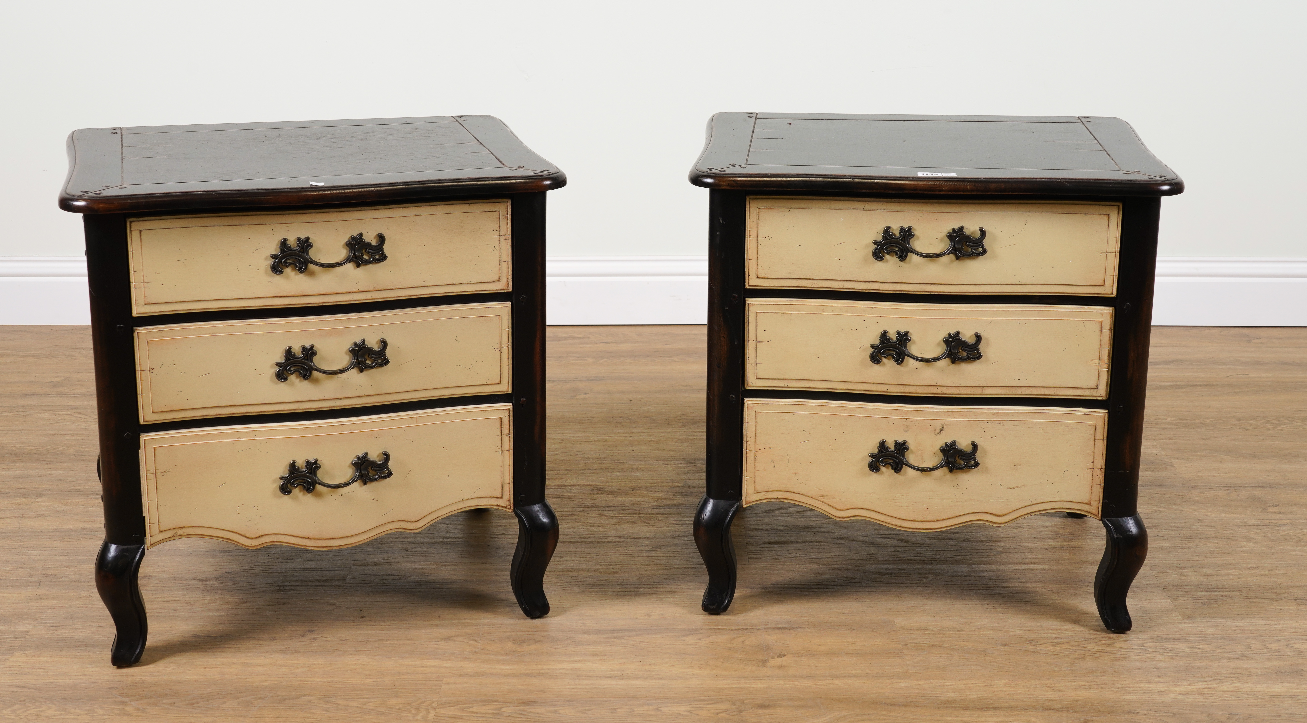 A PAIR OF FRENCH STYLE EBONISED AND
