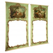 A PAIR OF FRENCH TRUMEAU MIRRO
