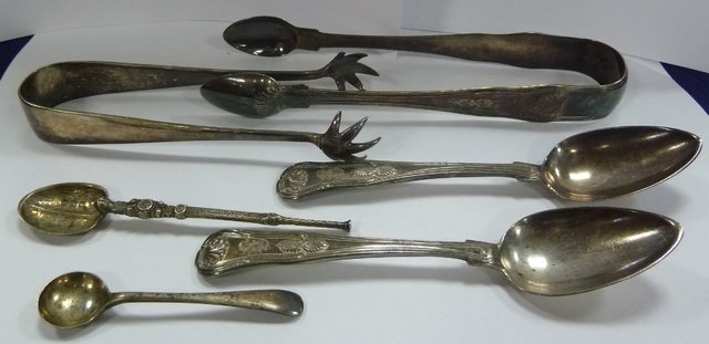 A pair of George IV silver sugar