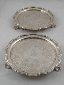 A pair of Georgian silver waiters