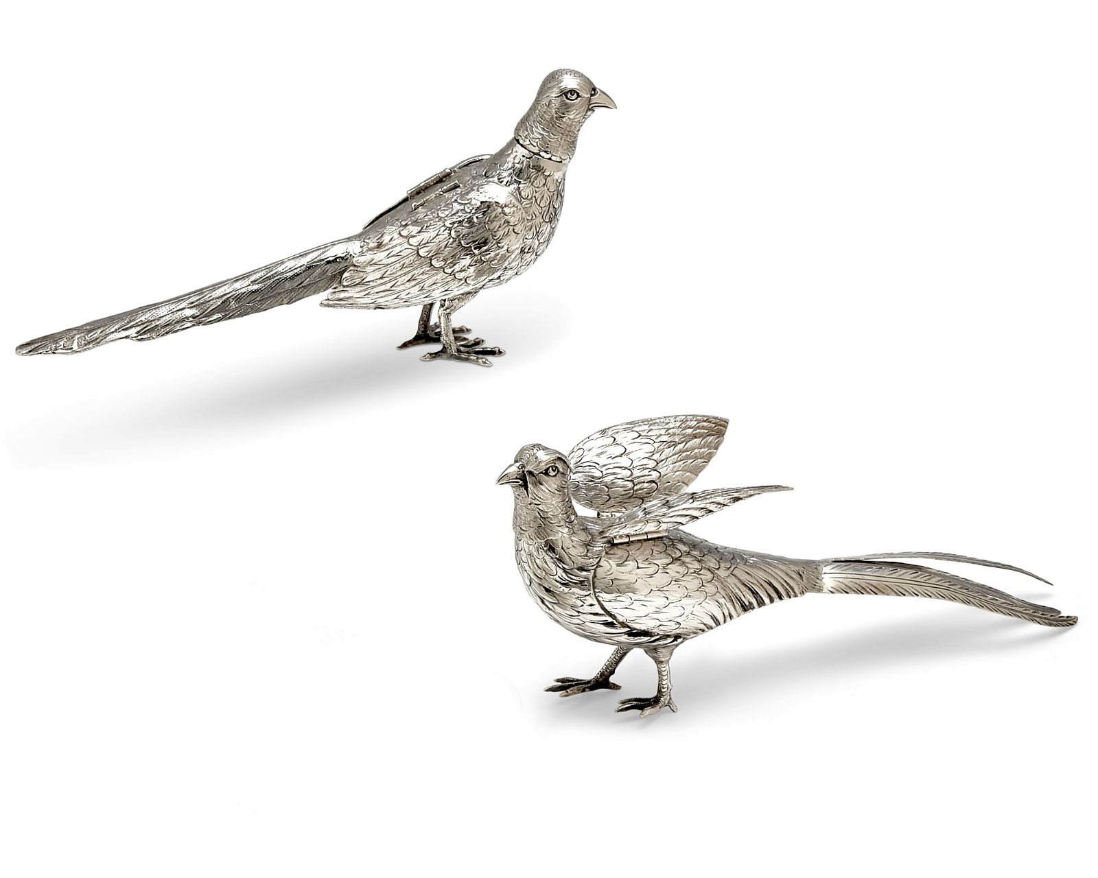 A PAIR OF GERMAN SILVER MODELS OF