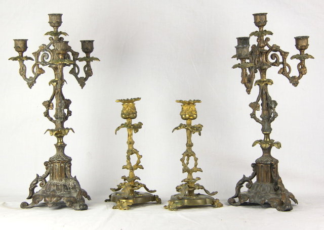 A pair of gilt and patinated