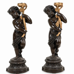 A Pair of Gilt and Patinated