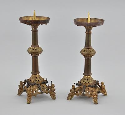 A Pair of Gilt Candle Holders