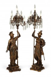 A PAIR OF GILT FIGURAL SEVEN L