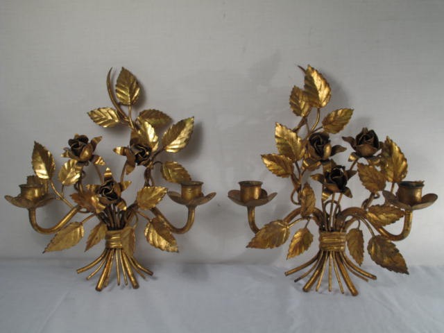 A pair of gilt metal wall sconces