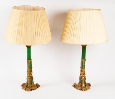 A pair of gilt metal mounted lamp