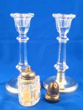 A pair of glass candlesticks w