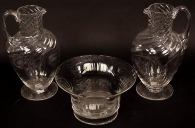 A pair of glass ewers, 21cm high