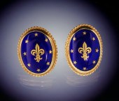 A Pair of Gold and Enamel Fleu