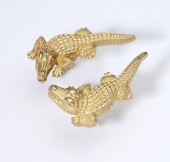 A pair of gold crocodile earri
