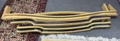 A pair of gold painted wooden