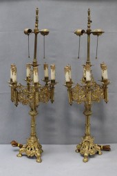 A PAIR OF GOTHIC STYLE BRASS C