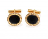 A PAIR OF GRAFF BLACK ENAMEL A