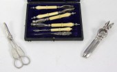 A pair of grape scissors with