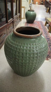 A PAIR OF GREEN GLAZE TERRACOT