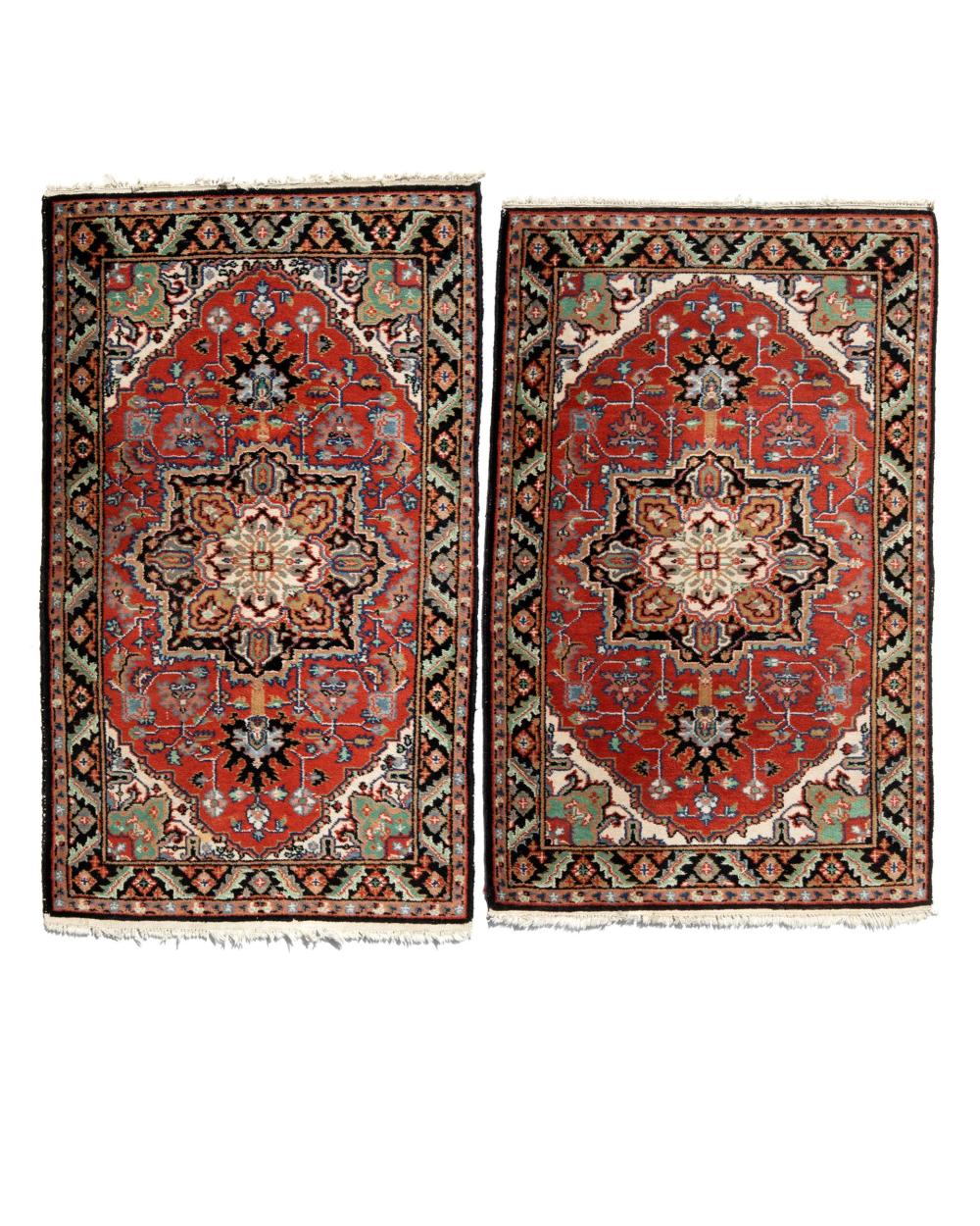 A PAIR OF HERIZ AREA RUGSA pair
