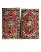 A PAIR OF HERIZ AREA RUGSA pai