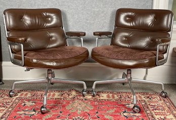 A pair of Herman Miller swiveling