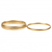 A PAIR OF HIGH POLISH GOLD BAN