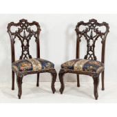 A PAIR OF HIGHLY CARVED MAHOGA