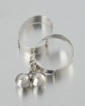 A PAIR OF HUBERT HARMON SILVER