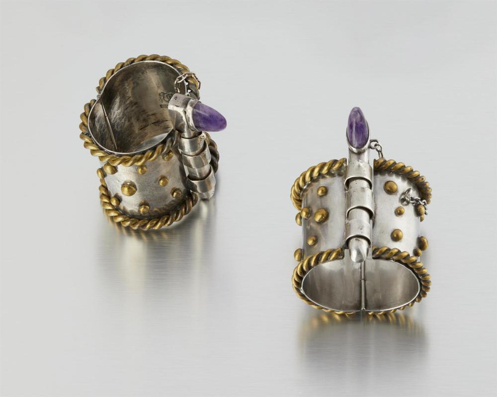 A PAIR OF HUBERT HARMON MIXED-METAL