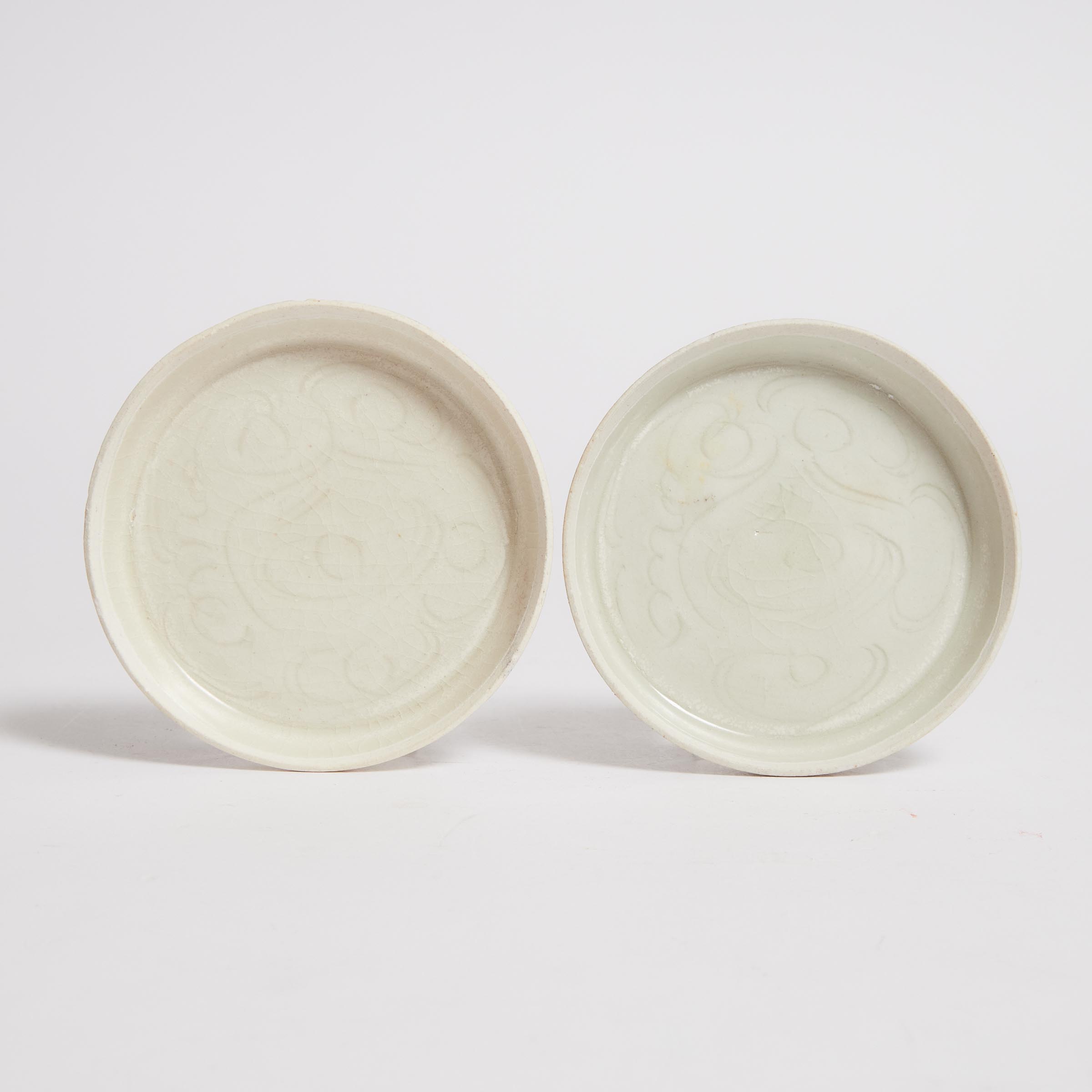 A Pair of Incised Qingbai Dishes,