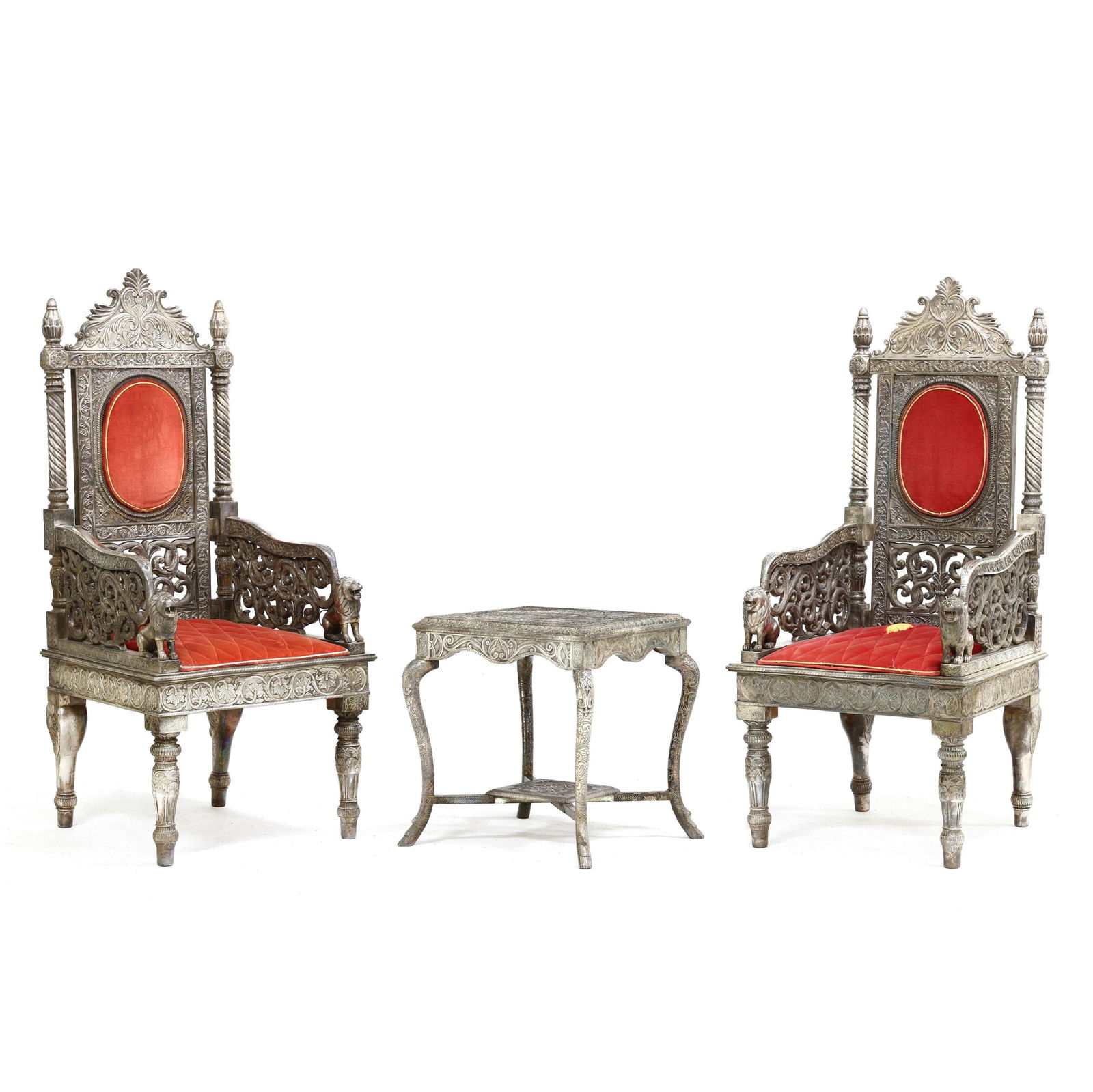 A PAIR OF INDIAN SILVERED METAL