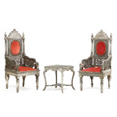 A PAIR OF INDIAN SILVERED META