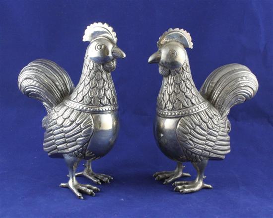 A pair of Indian white metal free