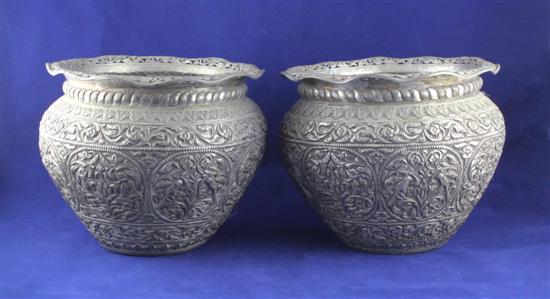 A pair of Indian white metal