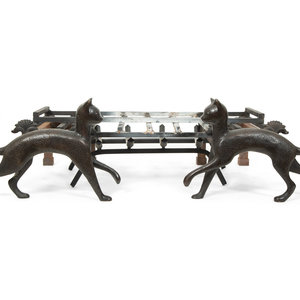 A Pair of Iron Cat Andirons after