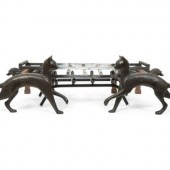 A Pair of Iron Cat Andirons af