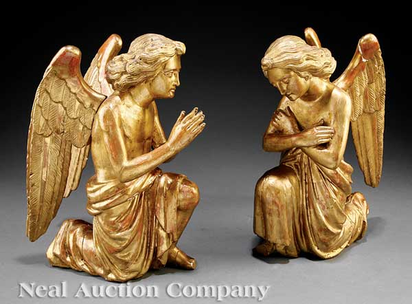A Pair of Italian Carved and