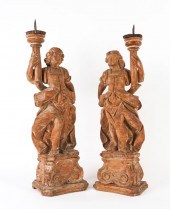 A PAIR OF ITALIAN LIMEWOOD FIG