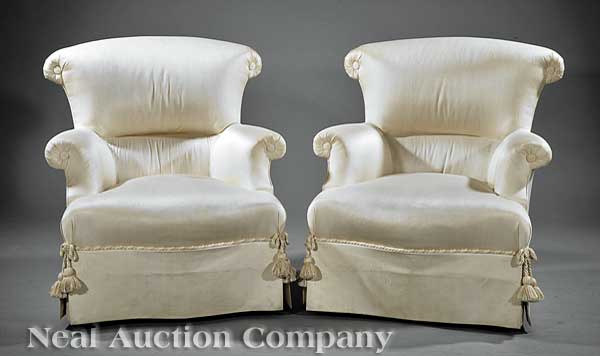 A Pair of Ivoire Silk Bergères in