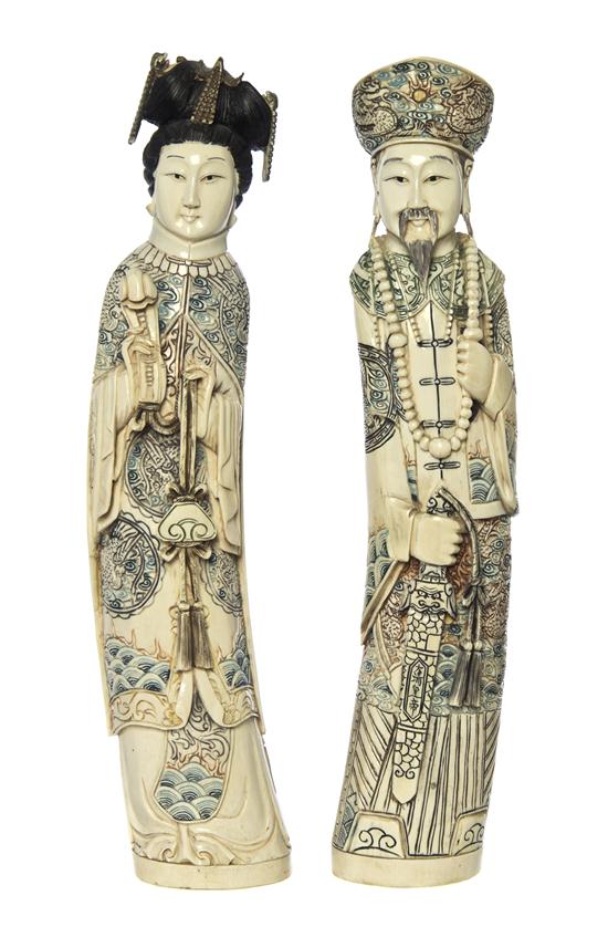 A Pair of Ivory Carvings of an