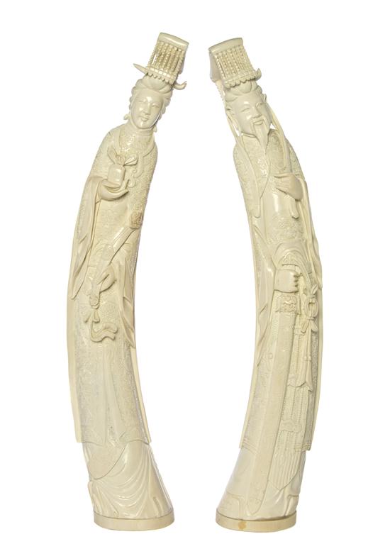 A Pair of Ivory Carvings of an