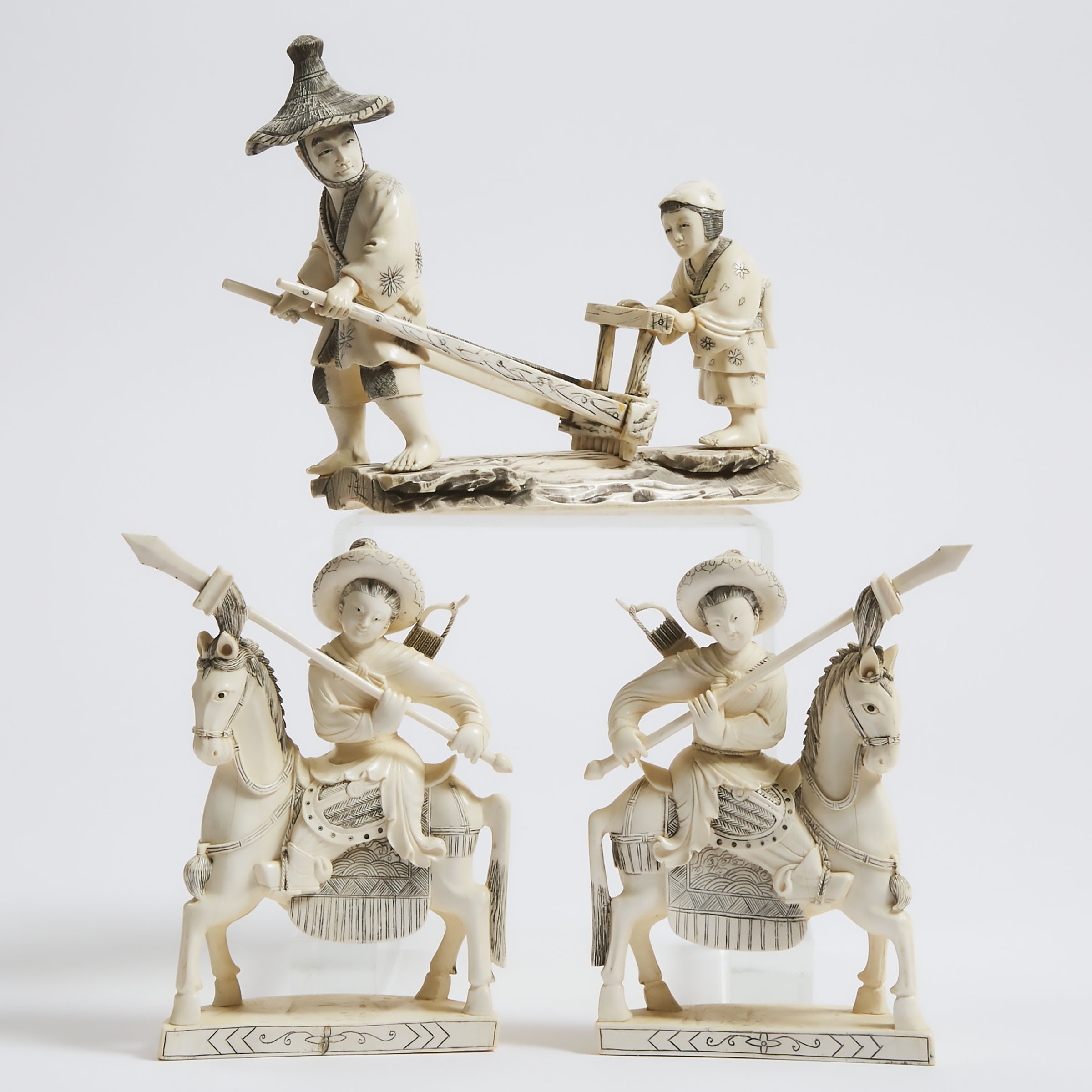 A Pair of Ivory Warriors on