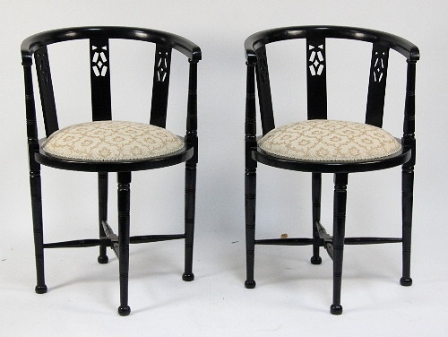 A pair of Japonesque ebonised
