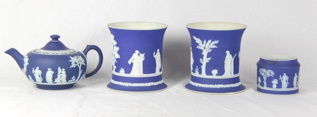 A pair of jasper ware spill vases