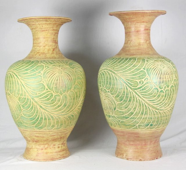 A pair of large ceramic vases