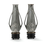A PAIR OF LARGE SILVER-PLATED